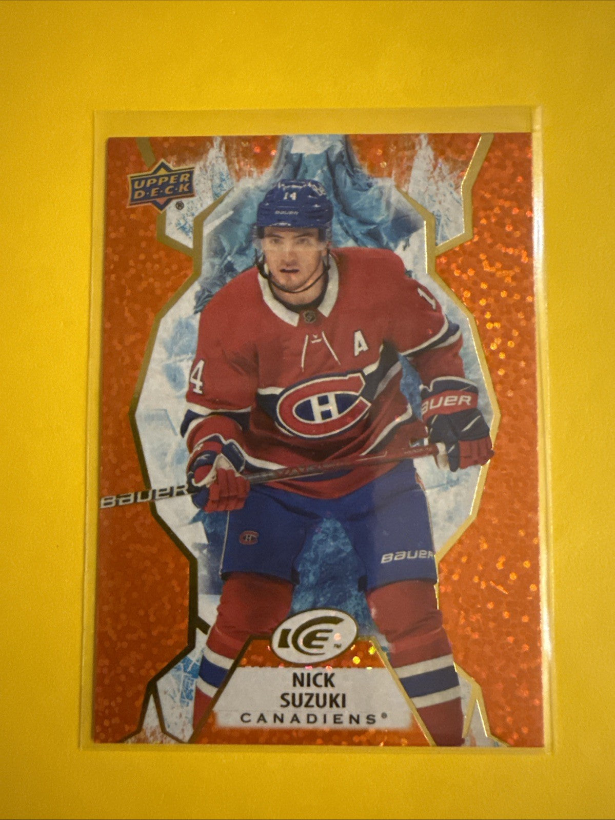Nick Suzuki 2021/22 UD Ice Orange Emerald Card - front