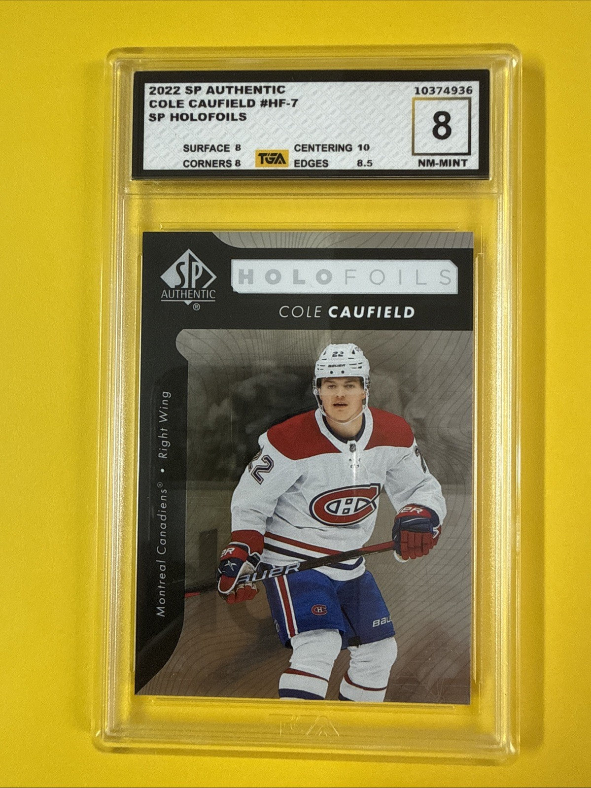 Cole Caufield 2022 SP Authentic Holofoils Card Graded 8 - front