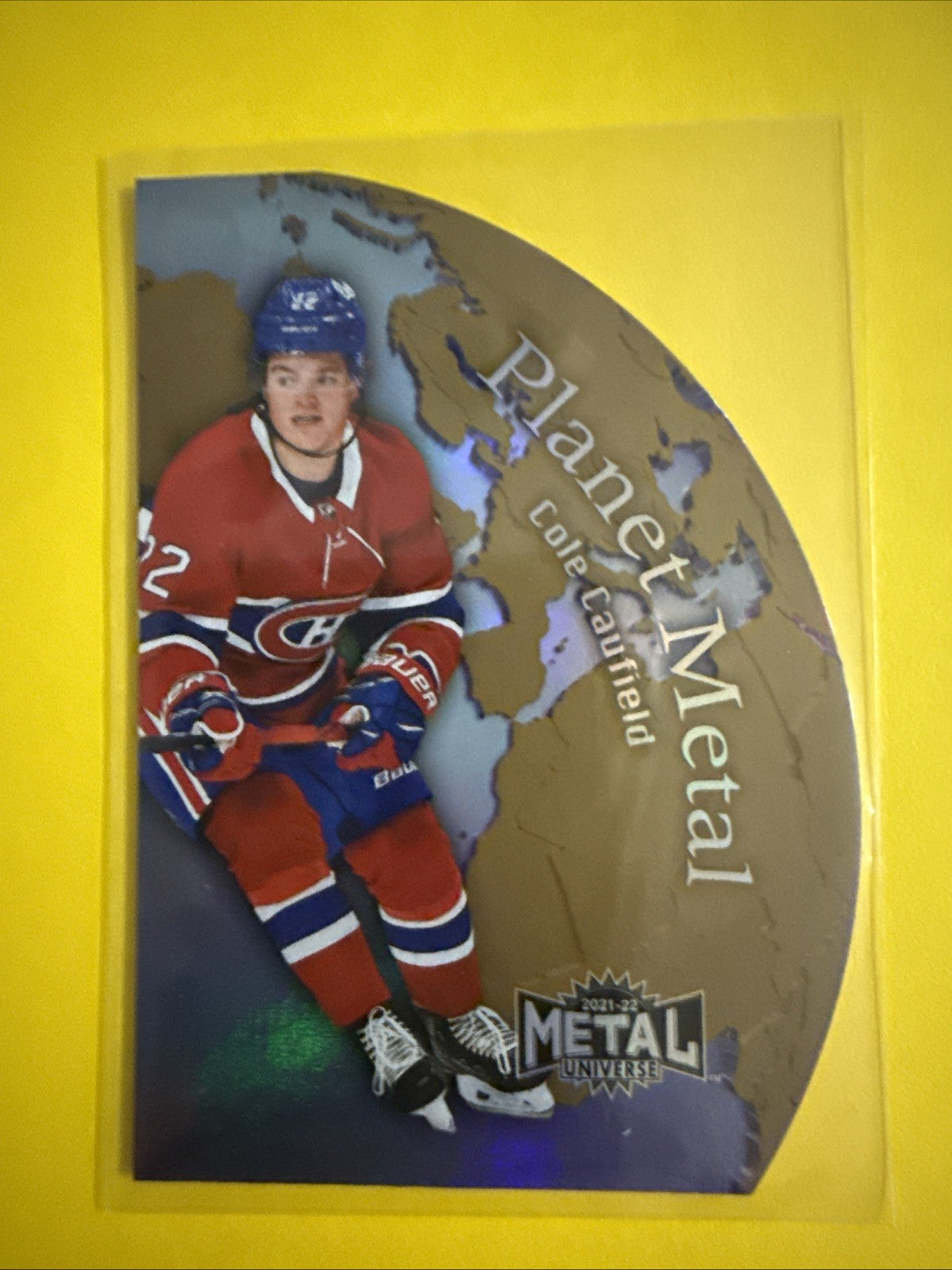 Cole Caufield 2021/22 Metal Universe Planet Rookie Card - front