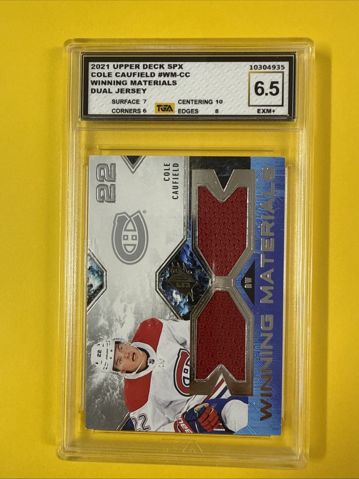 Cole Caufield 2021 UD SPx Winning Materials Jersey Rookie Card Graded 6.5 - front