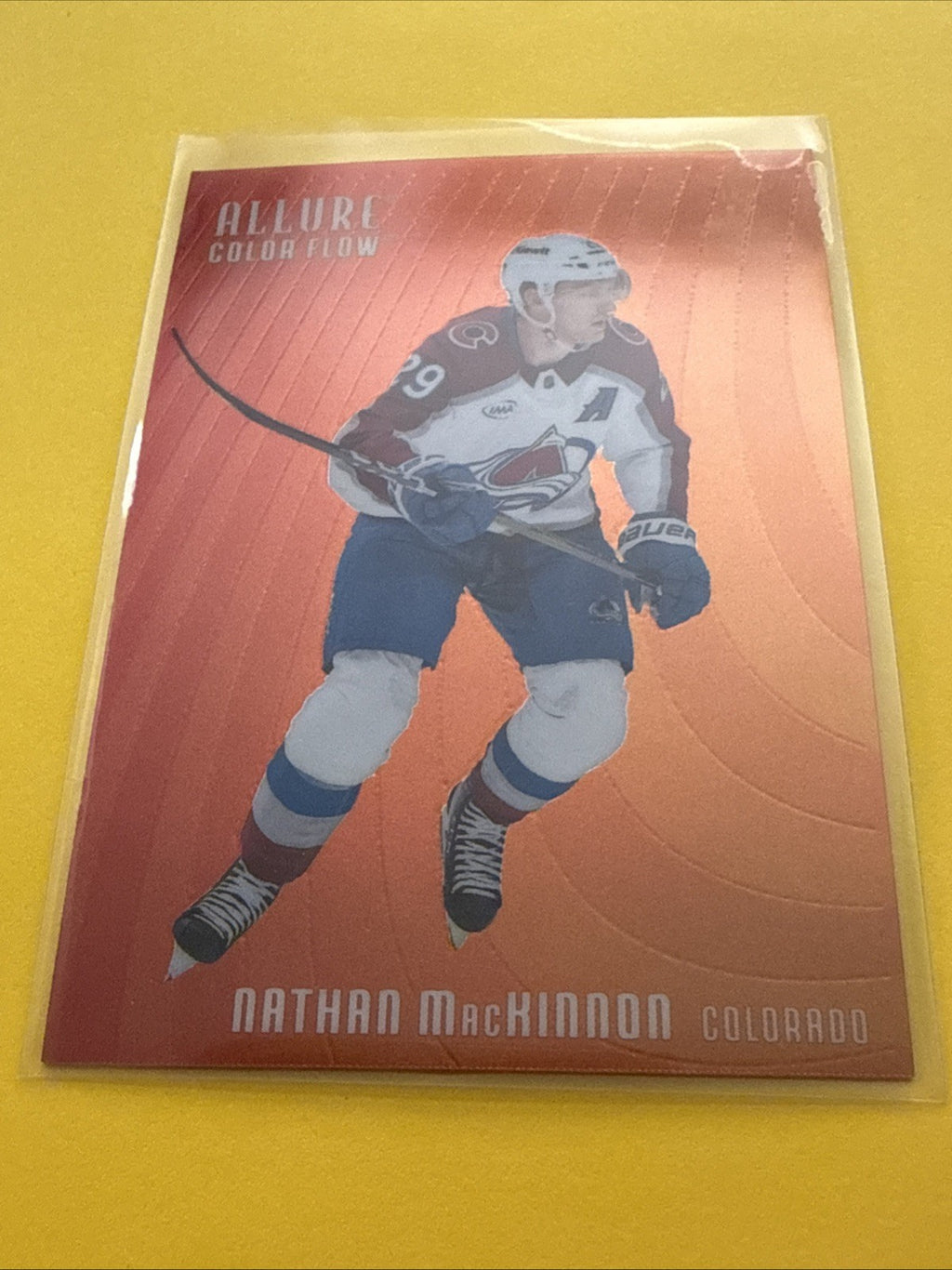 Nathan MacKinnon . 2025/26 Allure Red-Orange Card - front