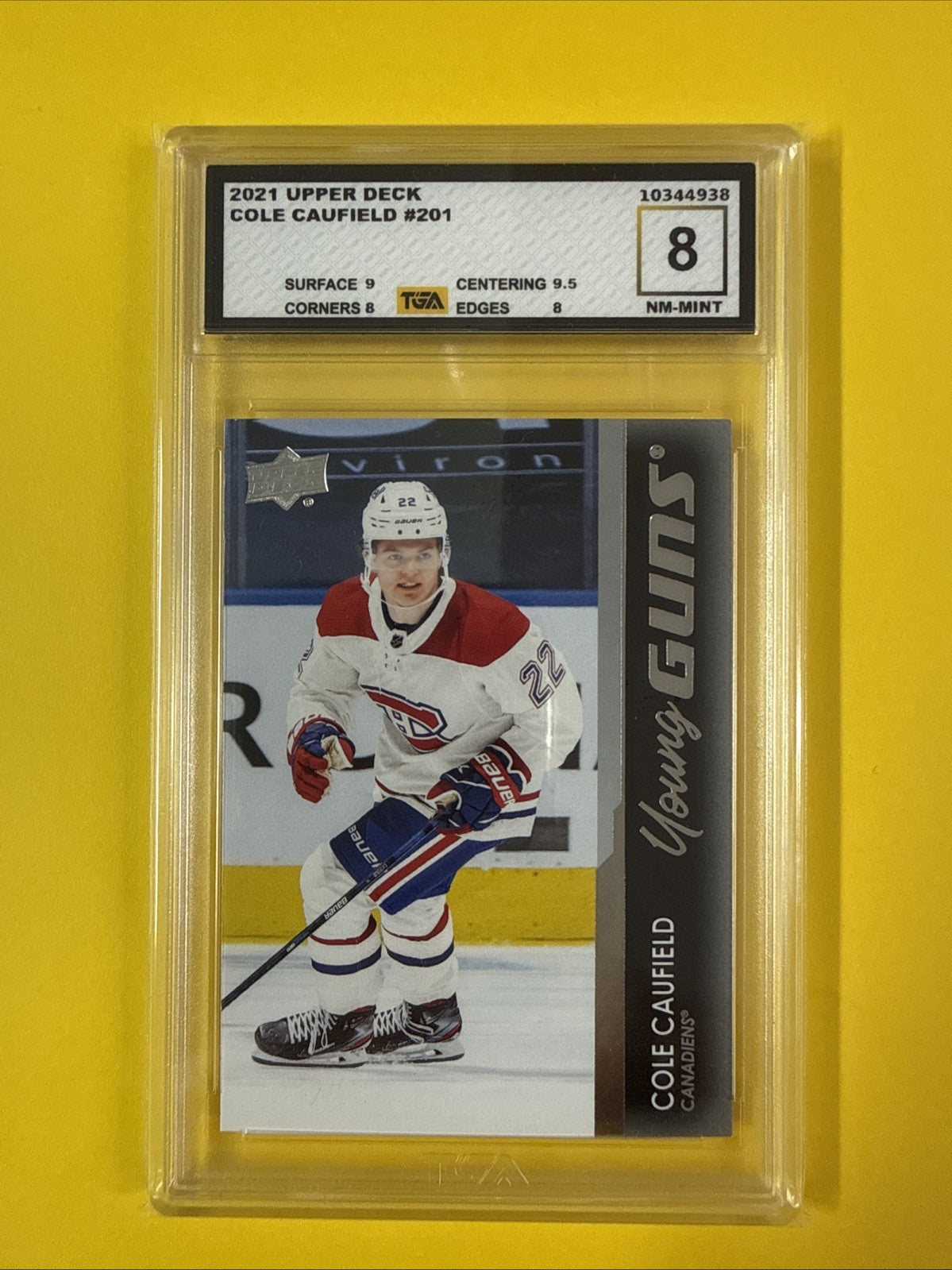 Cole Caufield 2021 UD Young Guns Rookie Card Graded 8 - front