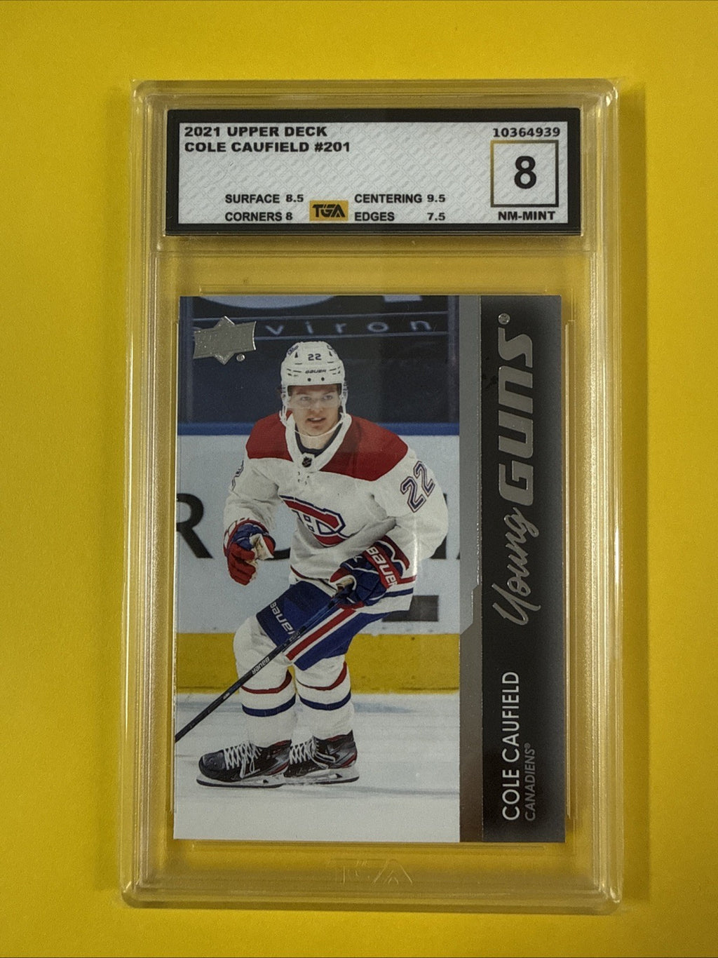 Cole Caufield 2021 UD Young Guns Rookie Card Graded 8 - front